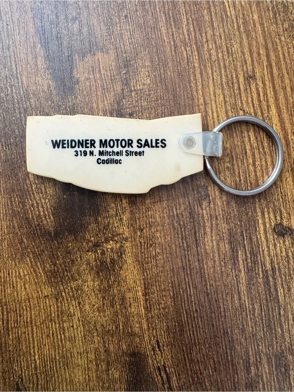 Vintage Weidner Motor Sales Cadillac MI Buckle Up For Safety Seat Belt Keychain